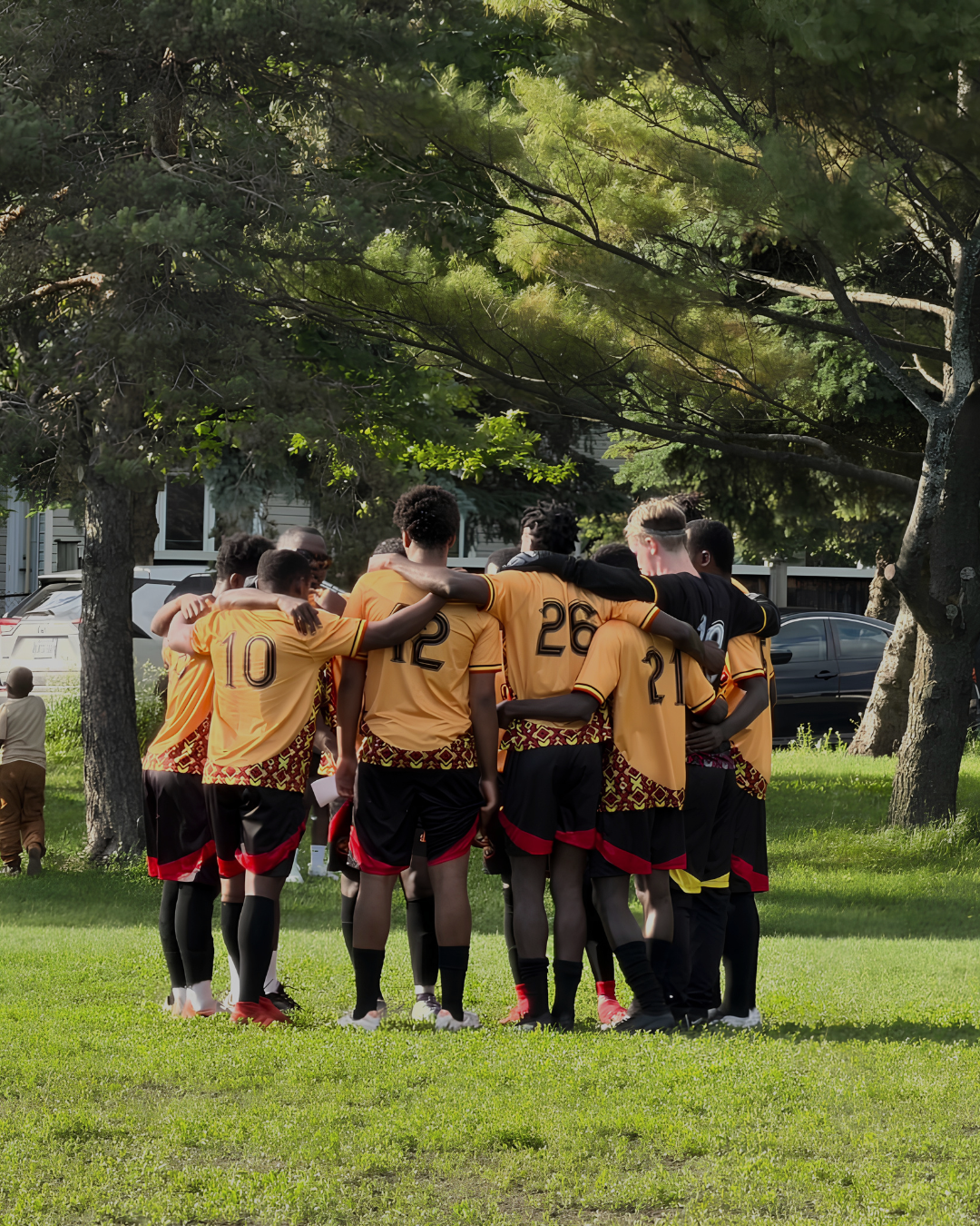 B6 Global Network players in team huddle during an outdoor training session