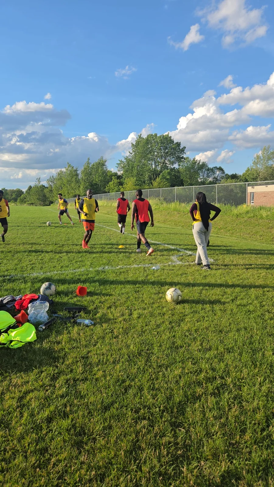 Academy coaching staff leading a technical session during an international training camp